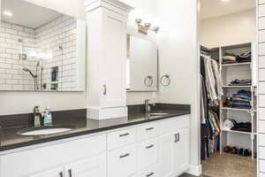 Bathroom with vanity and walk in shower