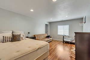 Bedroom featuring hardwood / wood-style flooring