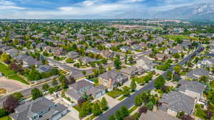 Birds eye view of property with a mountain view