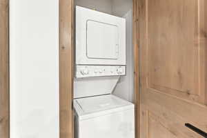 Laundry room with stacked washer / drying machine