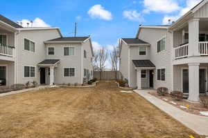 Exterior space featuring a lawn