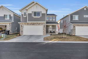 View of front of home with a garage