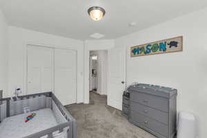 View of carpeted bedroom