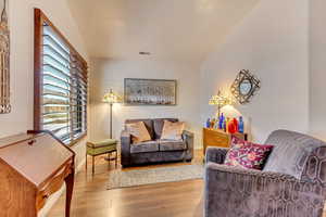 Living room featuring hardwood / wood-style flooring