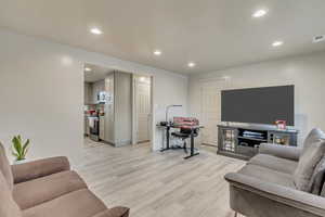 Living room featuring light hardwood / wood-style floors