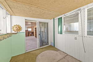 Interior space with a healthy amount of sunlight and wooden ceiling