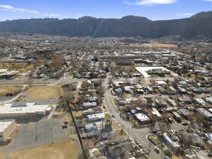 Birds eye view of property with a mountain view