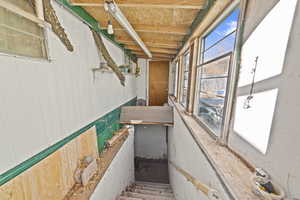 Stairway with wood walls