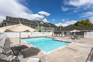 View of pool featuring a patio area