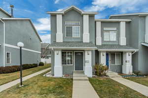 View of front of house with a front lawn