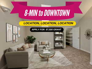 Living area featuring lofted ceiling, baseboards, and carpet flooring