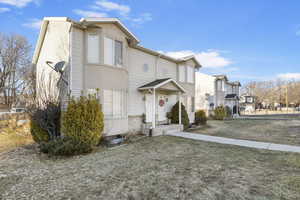 View of front of home featuring a front lawn