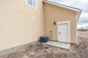 Property entrance featuring central AC