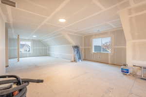 Bonus room featuring vaulted ceiling