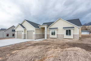 View of front of home featuring a garage