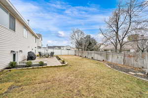 View of yard with a patio area