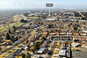 Birds eye view of property with a mountain view