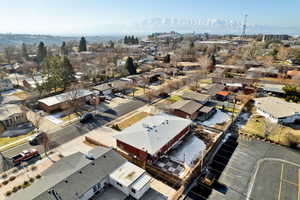 Birds eye view of property with a mountain view