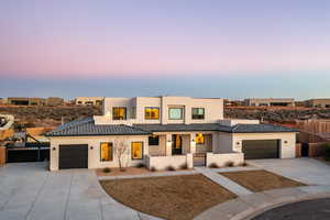 View of front of home featuring a garage