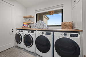 Laundry room with washer and dryer