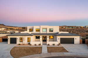 View of front of home with a garage