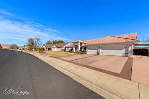 View of front of property with a garage