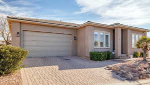 View of front of home featuring a garage