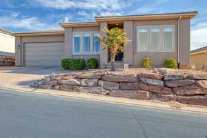 View of front of home with a garage