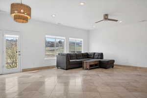 Living room featuring ceiling fan