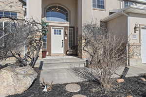 Entrance to property featuring a garage