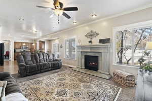 The great room. This is a large open space with a fireplace. GREAT ENTERTAINMENT SPACE as it is open to the kitchen and looks out to the backyard.