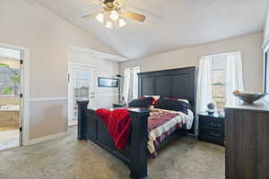 Primary bedroom showing door to the private balcony. The room has it's own bathroom with separate tub shower as well as a walk in closet.