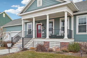 Property entrance with a garage