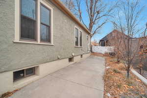 View of home's exterior with a patio