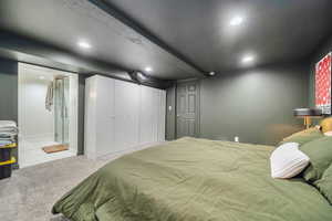 Master Bedroom with light carpet