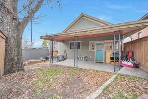 Back of property featuring a patio area