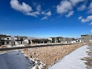 View of yard layered in snow