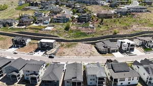 Birds eye view of property with a residential view