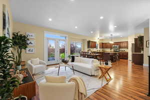 Living room with light wood-type flooring