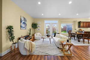 Living room featuring dark hardwood / wood-style flooring