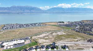 Bird's eye view featuring a water and mountain view