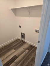 Laundry area with washer hookup, dark hardwood / wood-style flooring, and electric dryer hookup