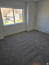 View of carpeted spare room