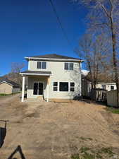 Rear view of property featuring a patio area