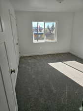 View of carpeted spare room