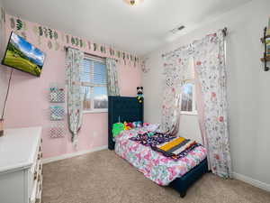 View of carpeted bedroom