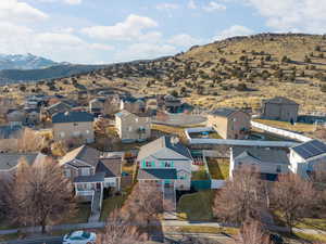 Drone / aerial view featuring a mountain view