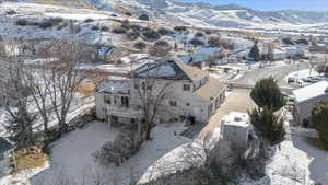 Snowy aerial view with a mountain view