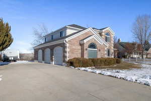 Front of property with a garage