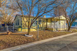 View of front of property with a porch